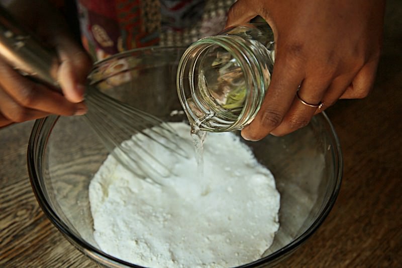 Add two cups of water, whisking in the dry ingredients