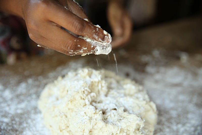 Dust the top of the dough with additional flour.