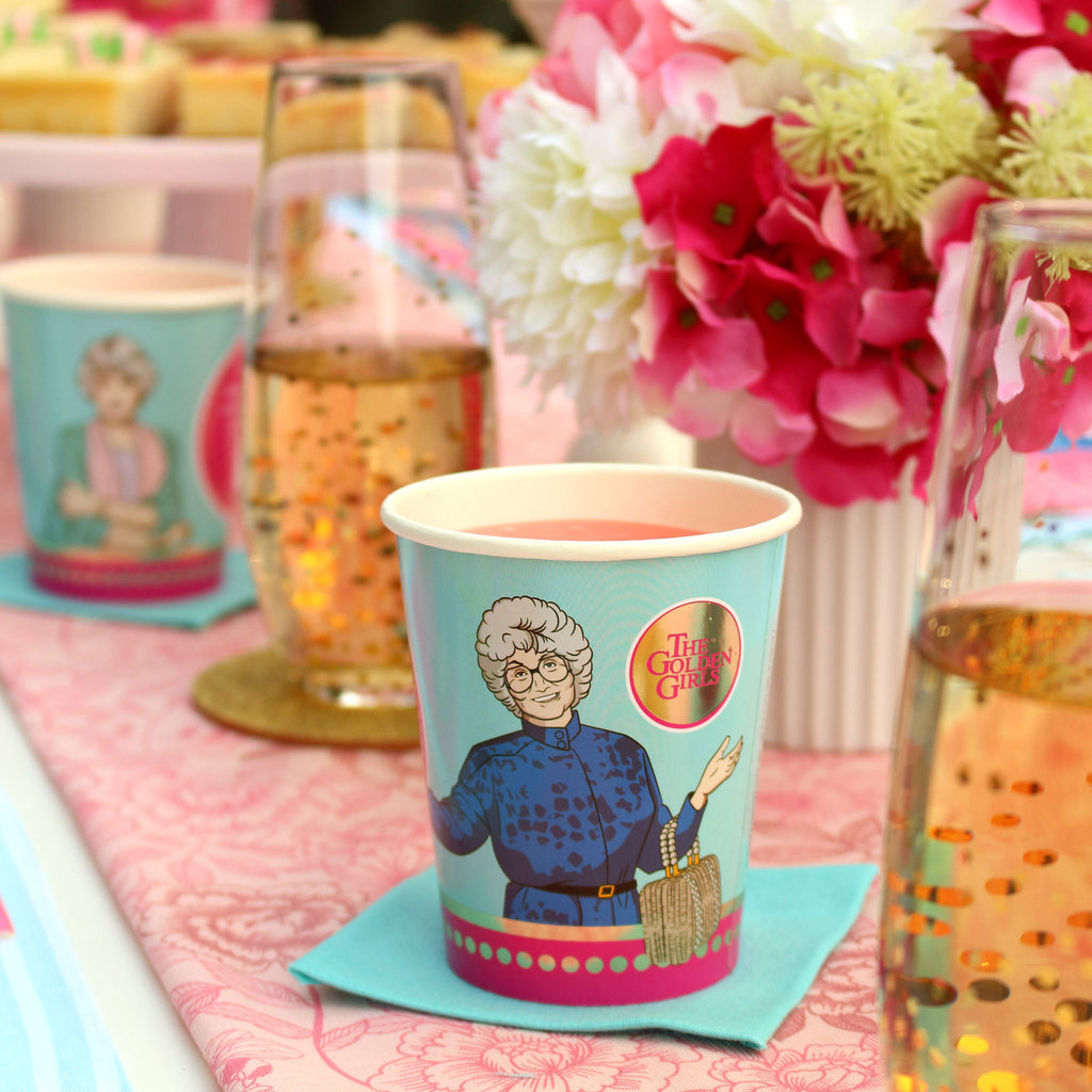 Golden Girls Cups are made with real heat stamped foil rest on our DIY drink coasters next to stemless champagne flutes flecked with gold confetti