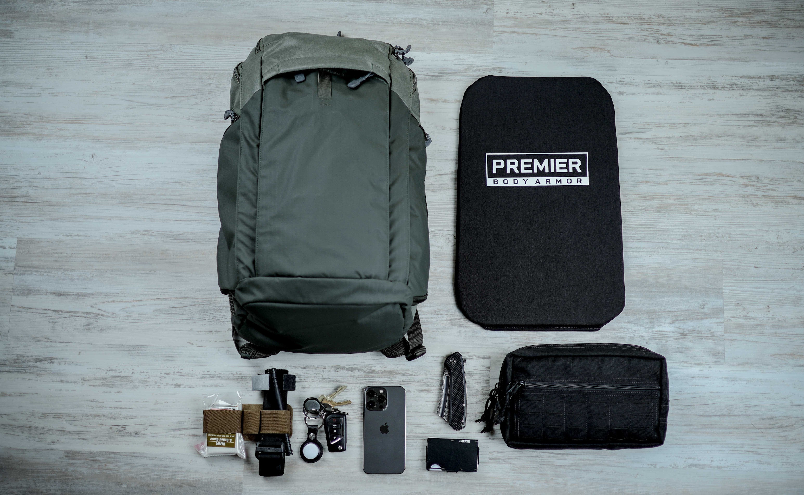 Image of an EDC loadout with the Vertx Gamut 3.0 armored backpack.