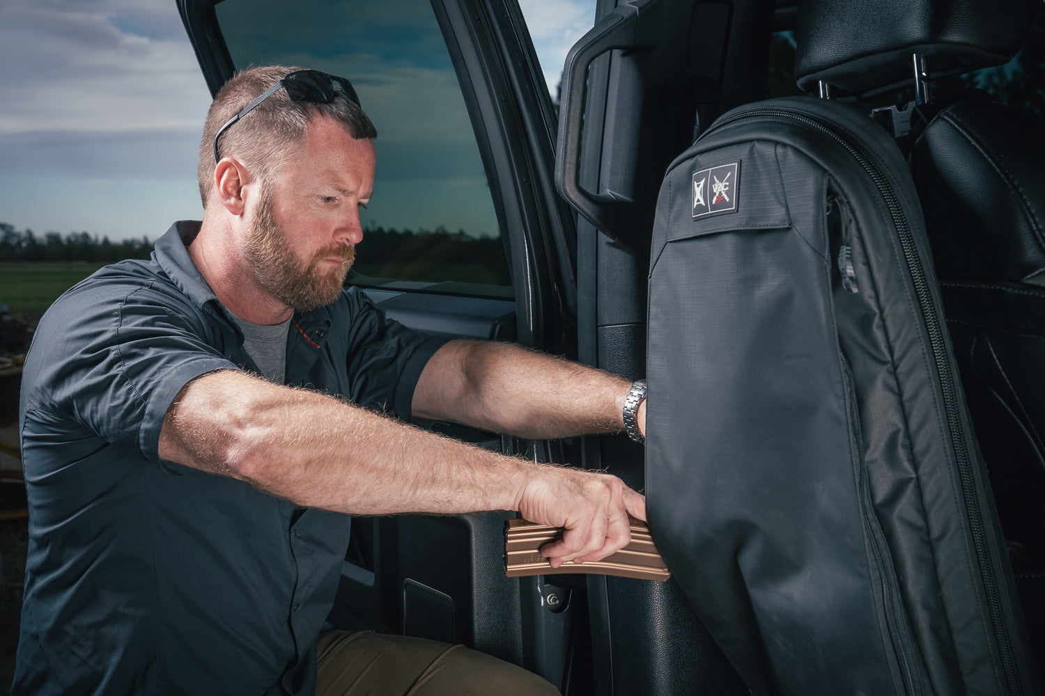 vertx rifle scabbard back on back of car seat