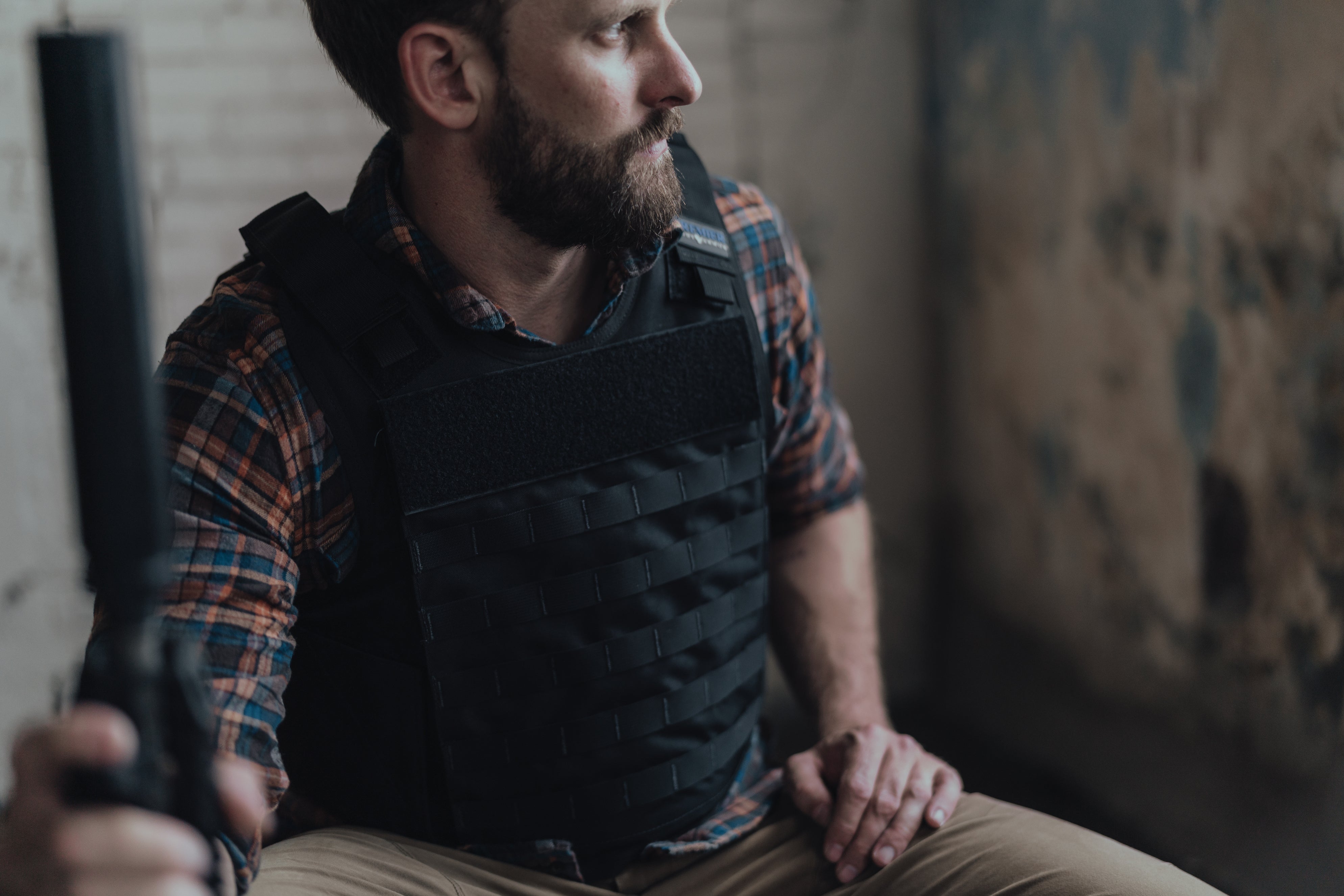 Hybrid Tactical Vest worn by a male model.