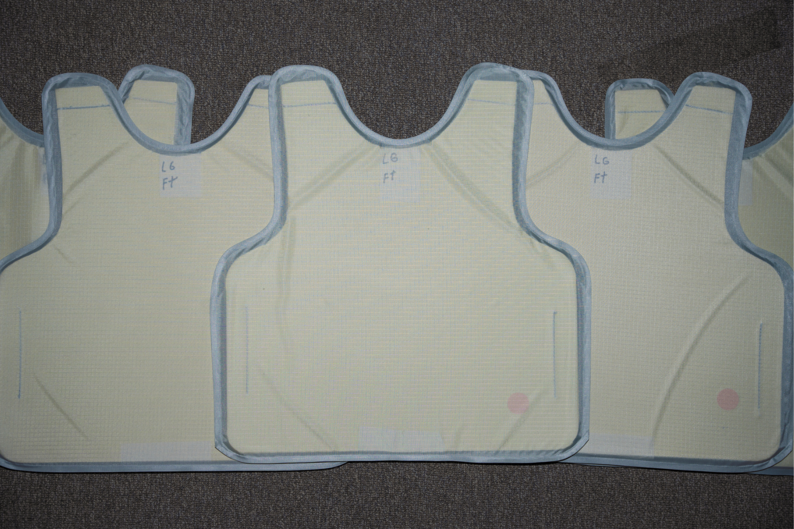 A bundle of Premier Body Armor vests during their testing stage