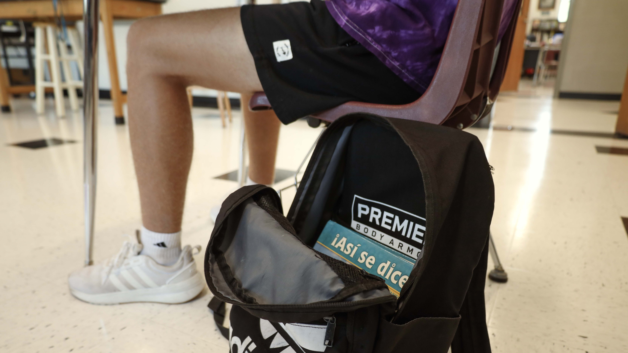 school backpack with bulletproof armor insert in classroom