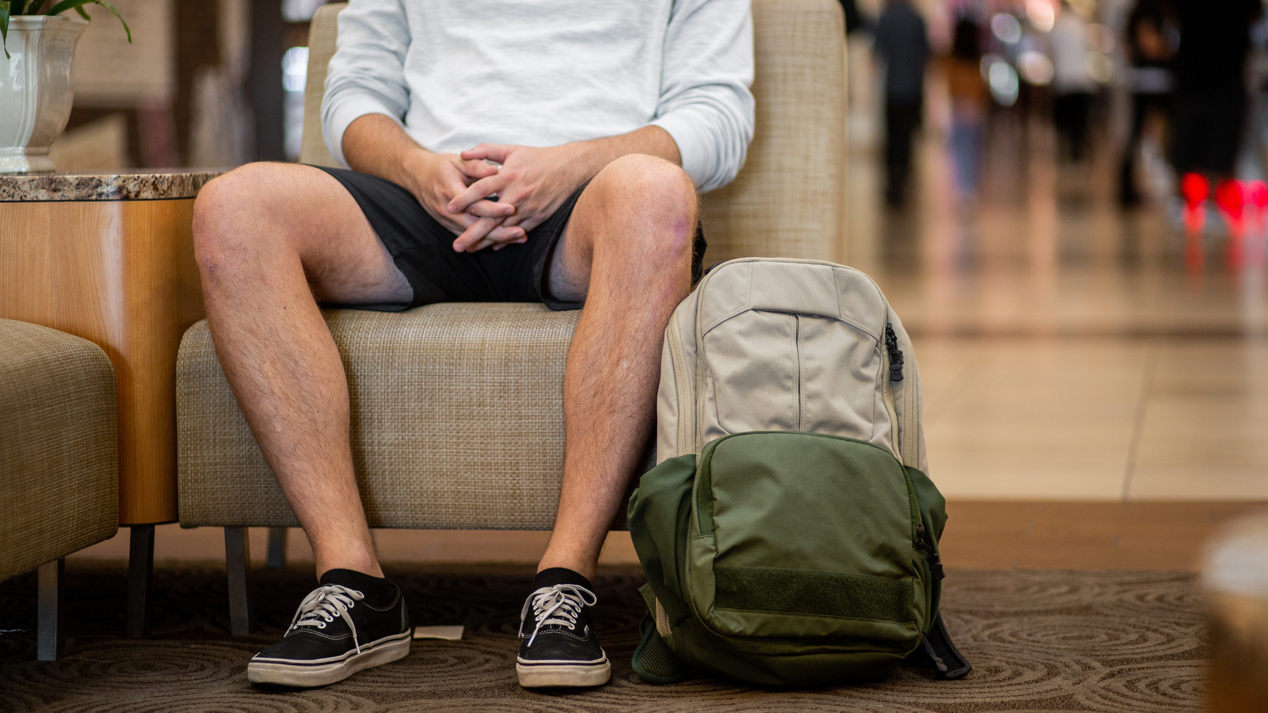 backpack in airport with passenger