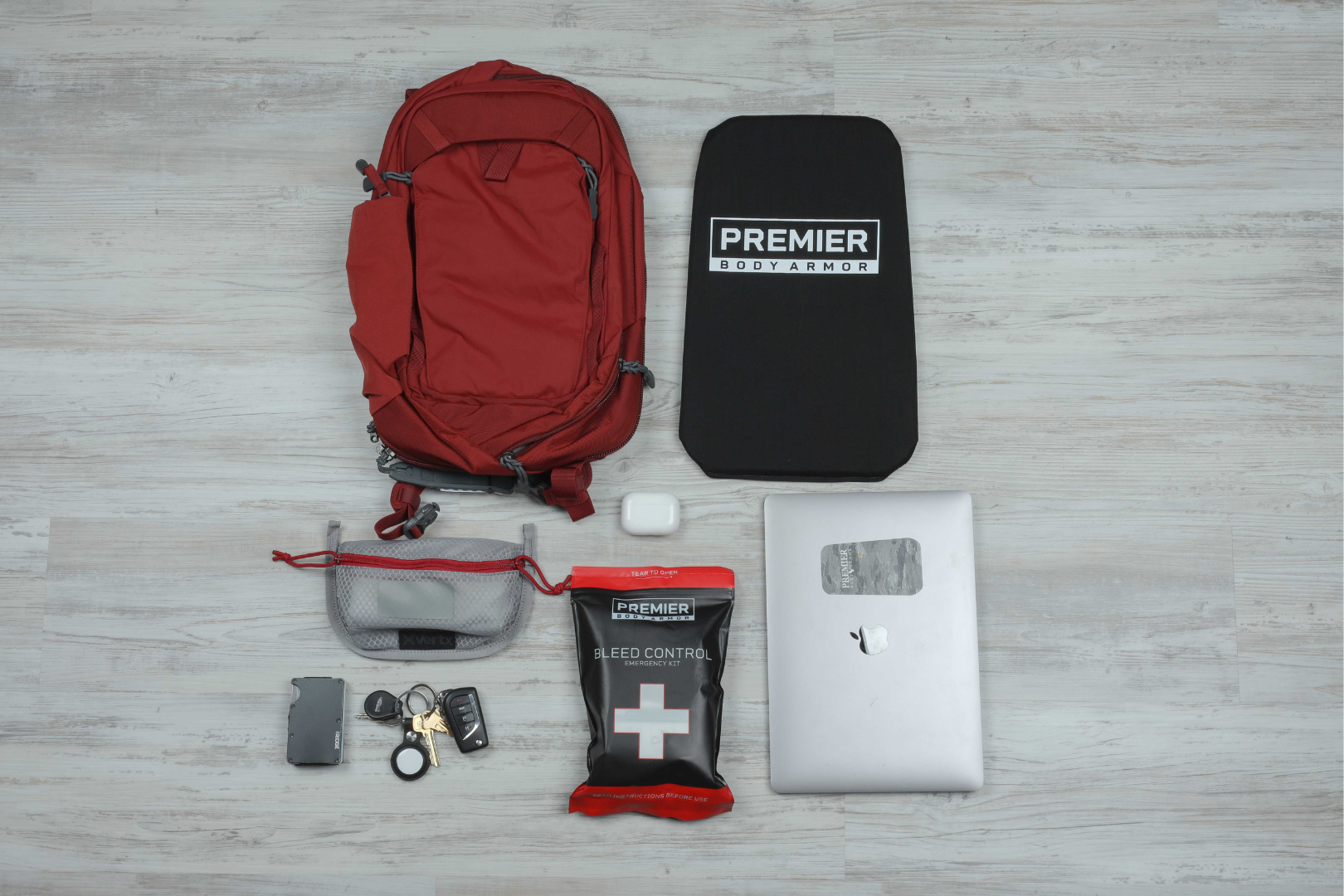 vertx transit sling bag with bulletproof panel, medical gear, and other everyday items