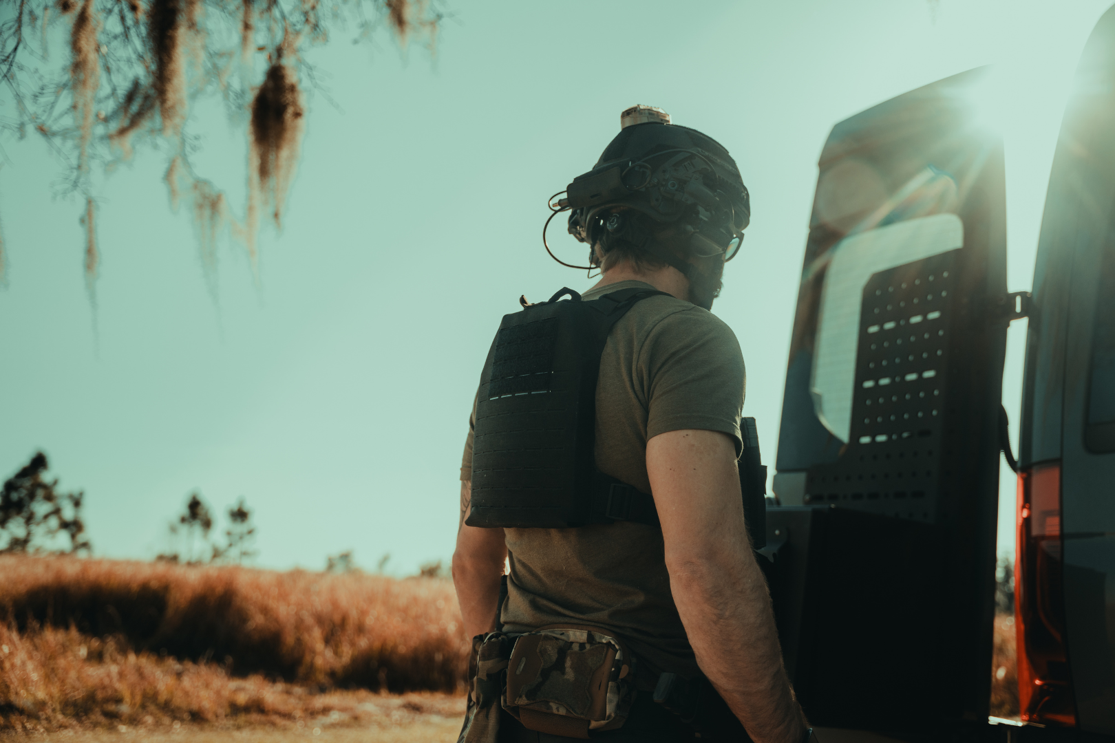 fortis level iv plate in plate carrier with molle and guy wearing body armor helmet