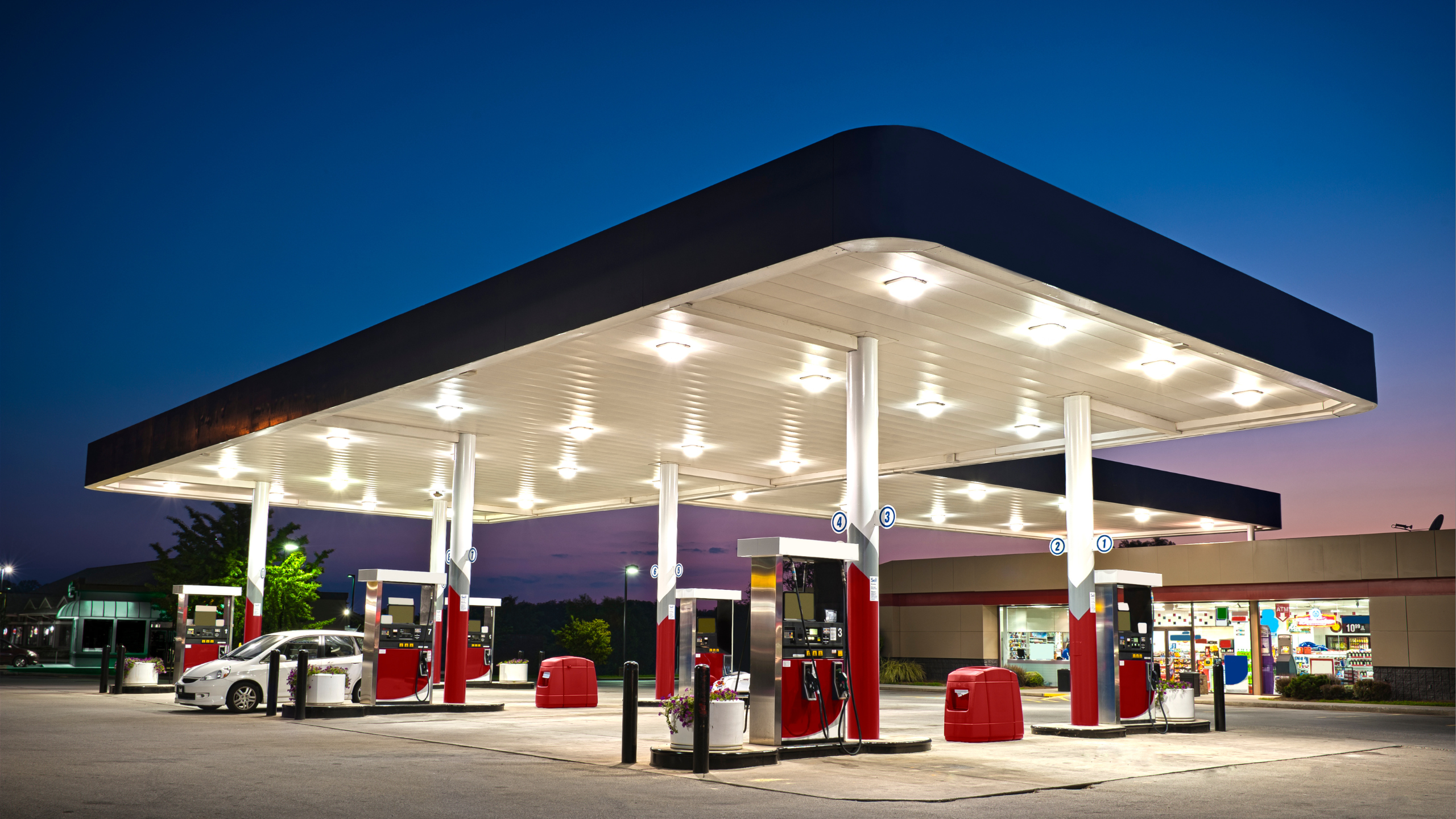 gas station at night with lights on