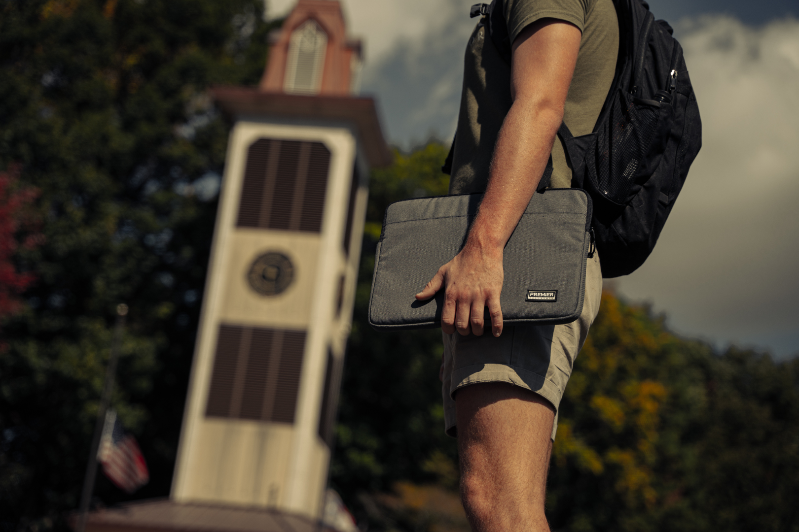 college student with bulletproof laptop case in hand