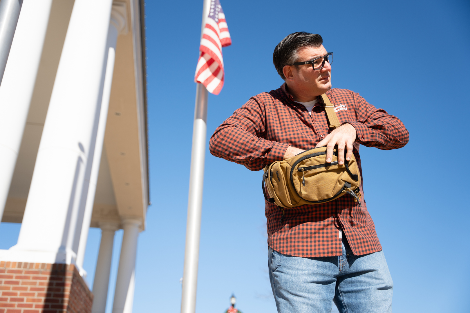 man in town with viktos sling bag for off body ccw carry