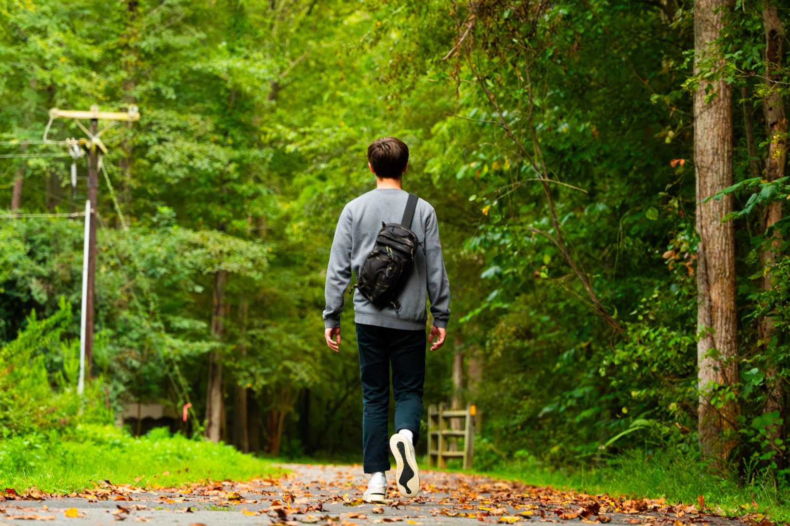 walking through greenway with ccw slingbag for safety