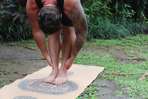 Yogi on an Eco Friendly Cork Yoga Mat in the Jungle