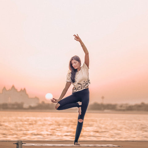 Elegant Yoga Pose On the Beach at Sunset