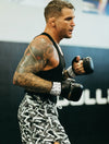 Dustin Poirier training with his Gym-To-Street favorites