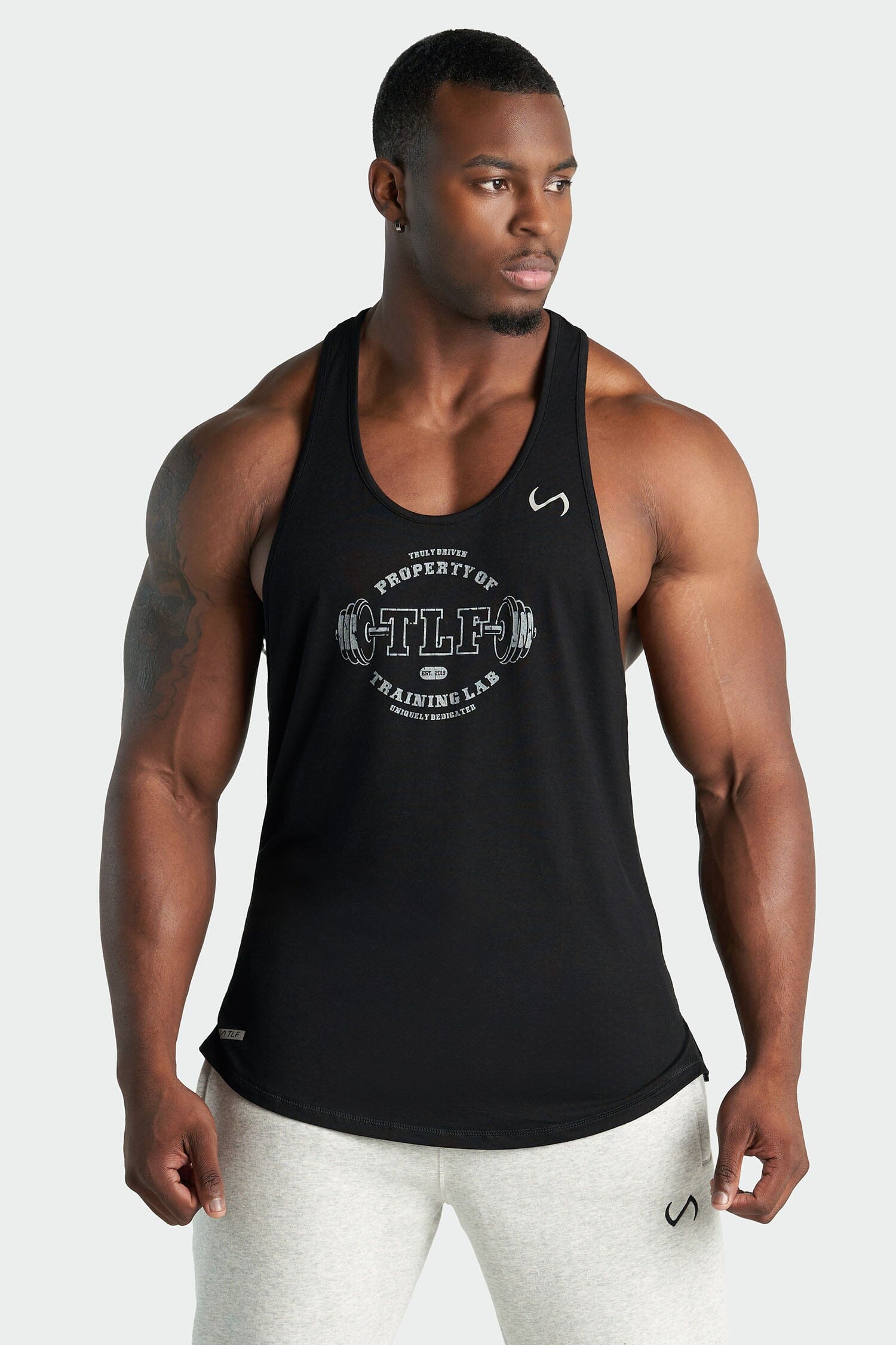 Property of TLF Stringer Tank | TLF Apparel