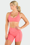 Front View of Hot Coral Tempo Strappy Back Sports Bra