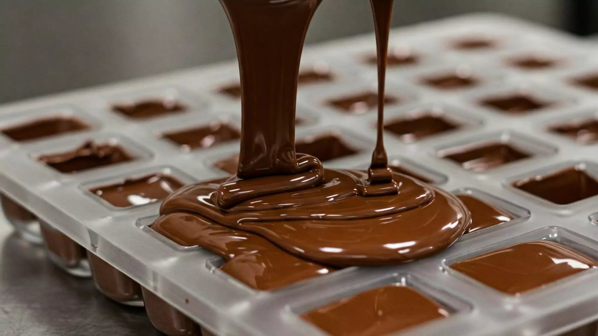 pouring chocolate in the molds