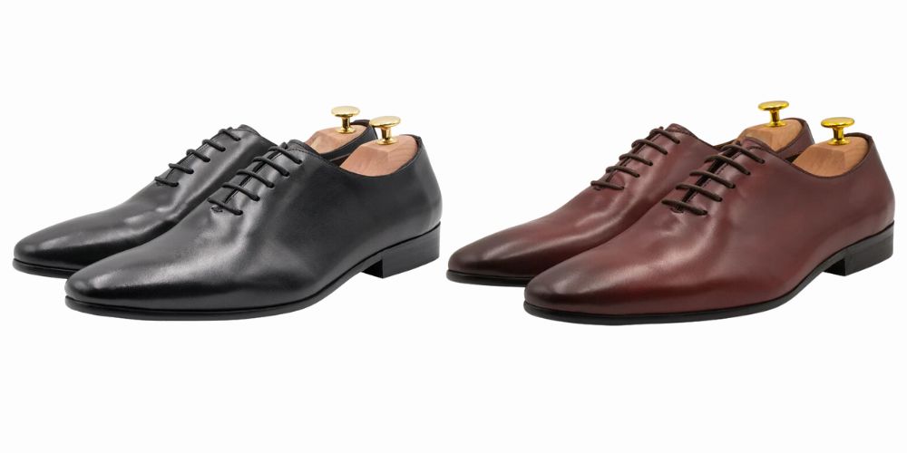 black and oxblood wholecut shoes