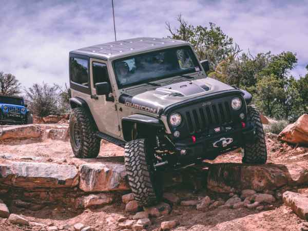 Grey Jeep Car On a Rocky Overlanding Trail