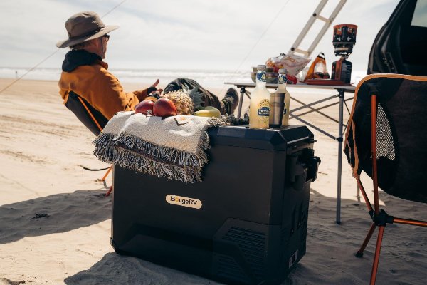 Man camping using BougeRV’s 12V car fridge