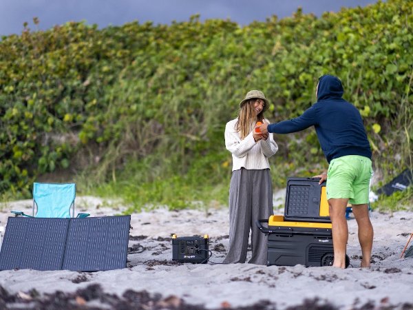 Using BougeRV 100-watt solar panel, portable power station, and potable fridge for beach camping