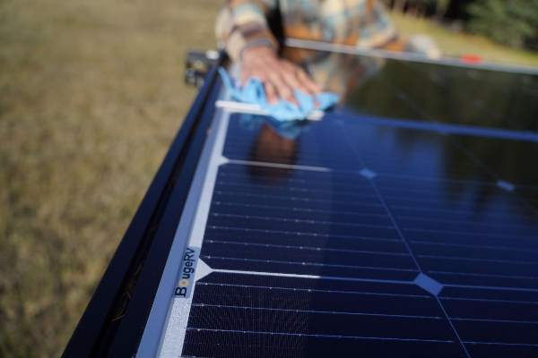 removing dust from a solar panel