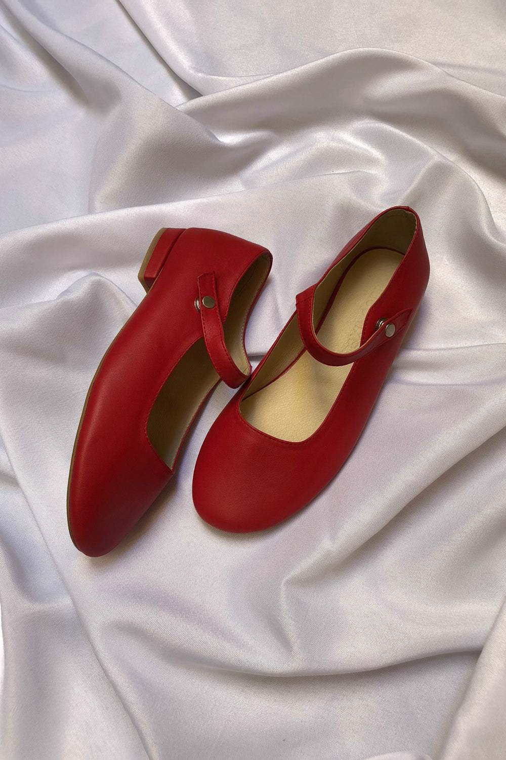 red leather ballet flats