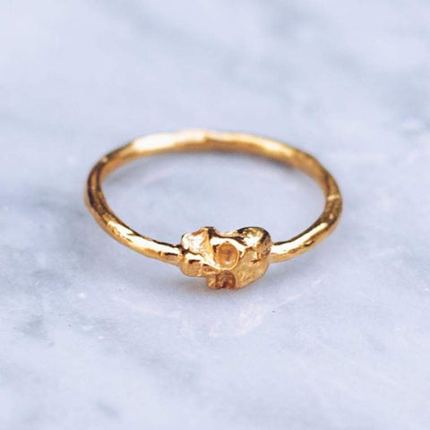 Golden skull ring