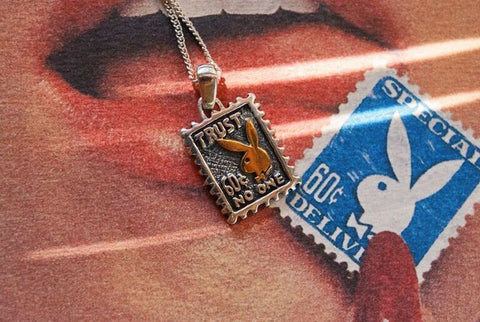 Which celebrities have been seen wearing Playboy necklaces