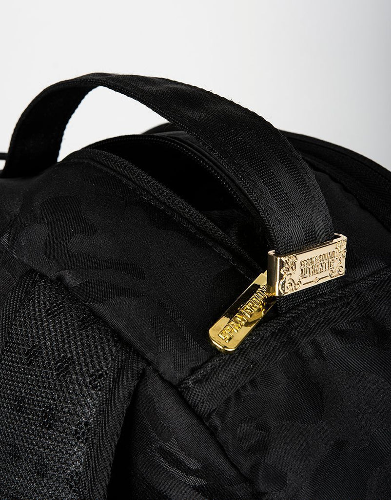 sprayground black and gold backpack