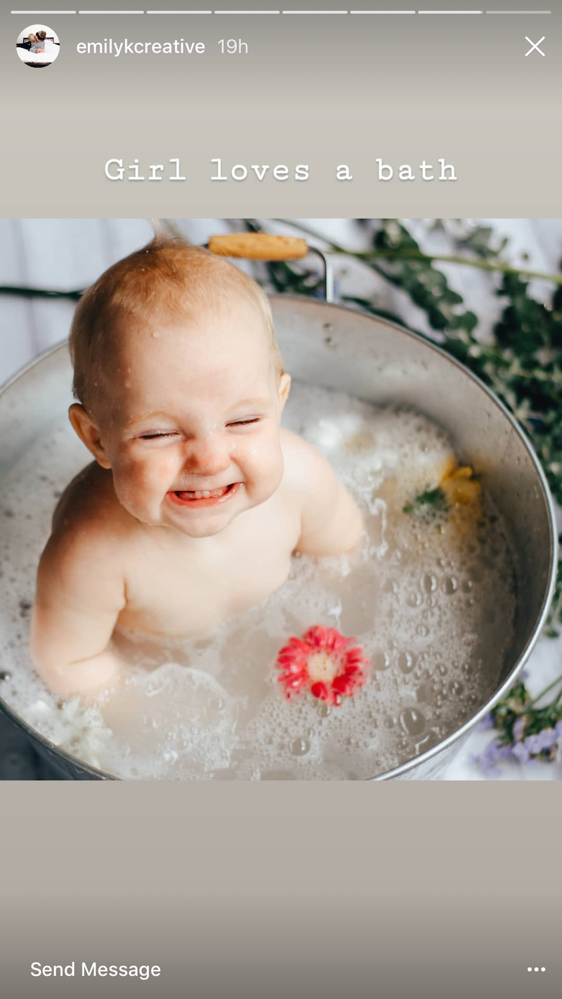 baby smile in the vegan milk bath photo session