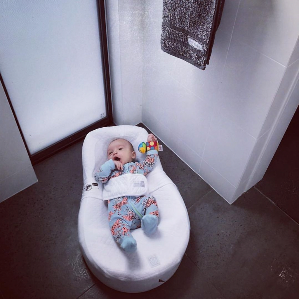 Baby in Cocoonababy in bathroom