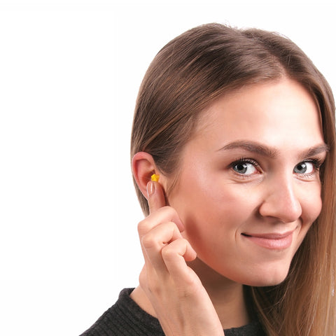 girl wearing pq small foam earplugs