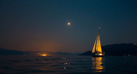 Sailboat at night.