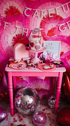 Galentines photo area set up. Pink and disco balls