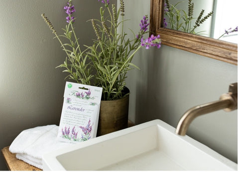 Lavender scented sachet on guest bathroom counter
