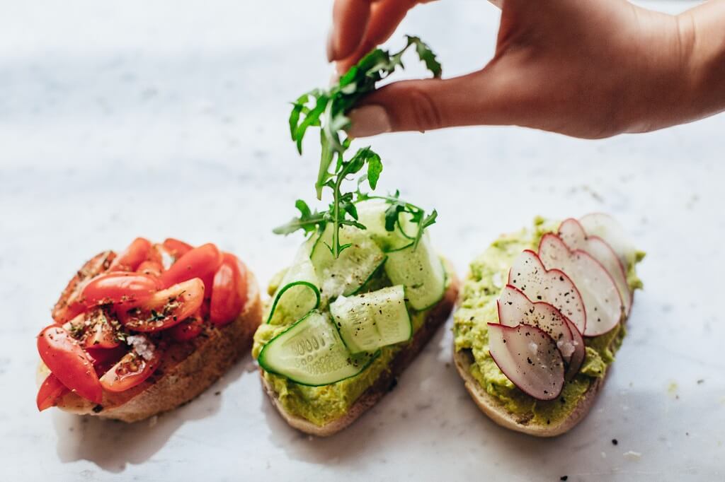 Three assortments of veggie avocado toasts rich in fiber for gut health