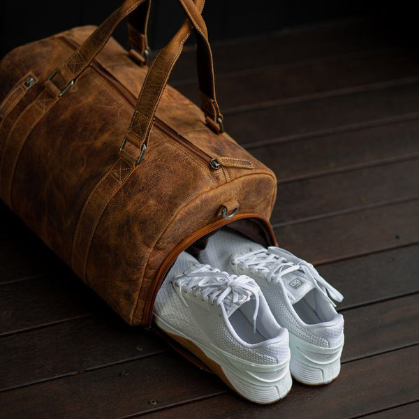 shoe compartment leather bag