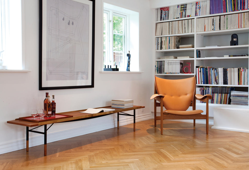 Chieftain chair, bench and chair by Finn Juhl in living room