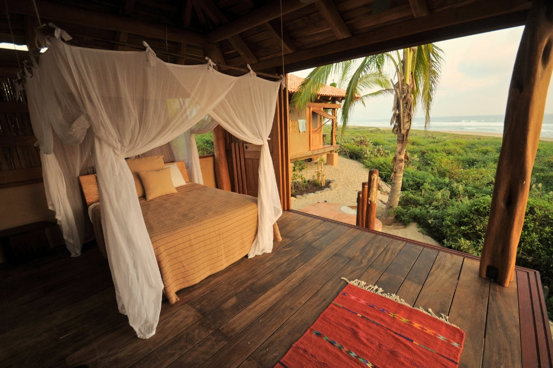 playa viva eco lodge canopy bed and ocean