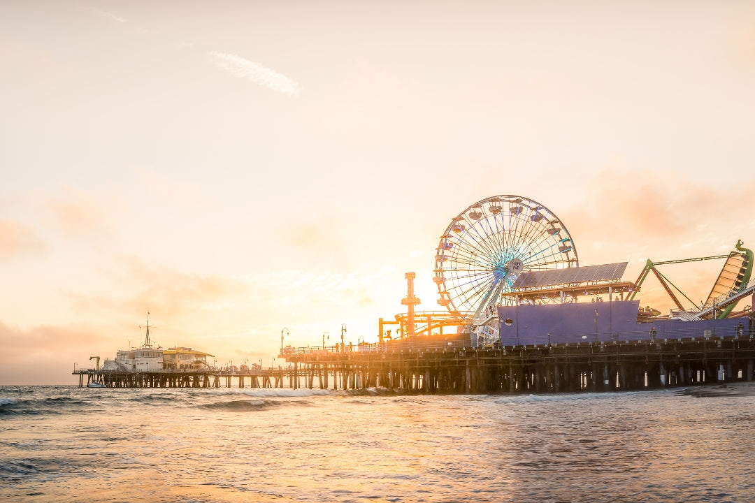 santa monica pier and amusement park at sunset