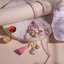 Rosy Pink Pearl Bhaiya Bhabhi Rakhi Set