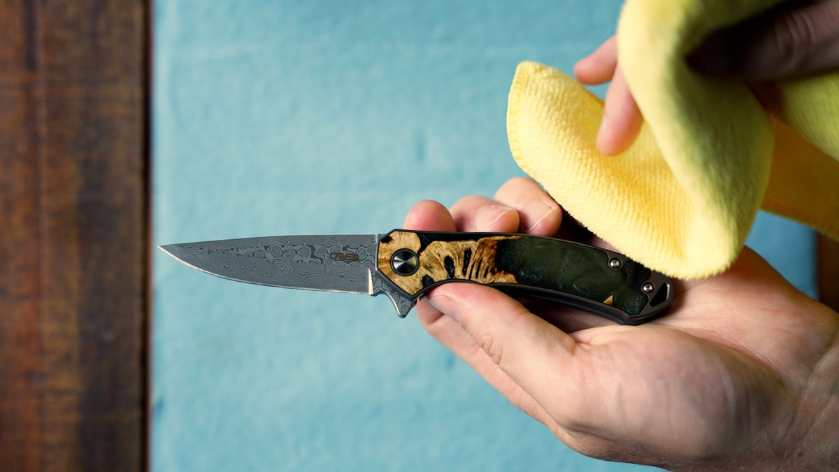 Holding Carved Pocket Knife