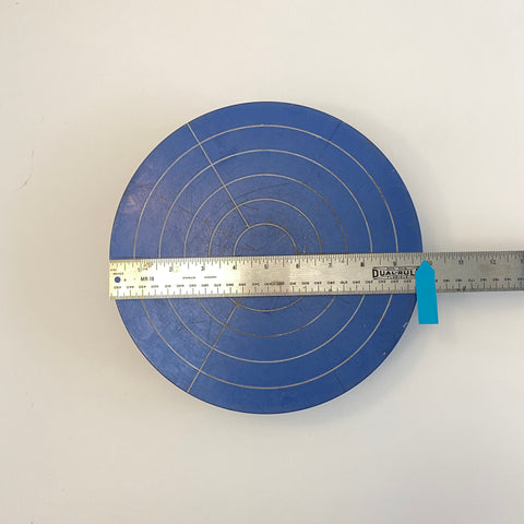 Blue Shimpo Banding wheel and ruler showing the diameter as 9.75 inches