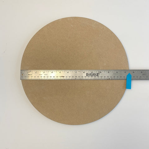 Wooden Bat and ruler showing diameter as 13.5 inches