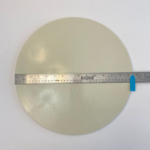 Plastic Bat and ruler showing diameter as 14.5 inches