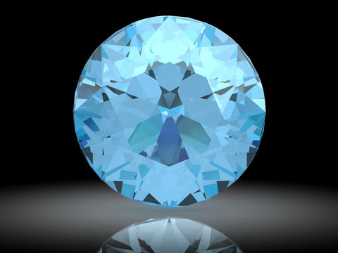 Stunning sea blue aquamarine clear and faceted against a black background