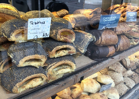 Pic of a typical window of a Danish Bakery with Tebirkes and various other buns