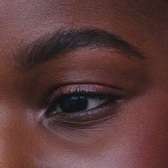 Woman with rounded arch brows