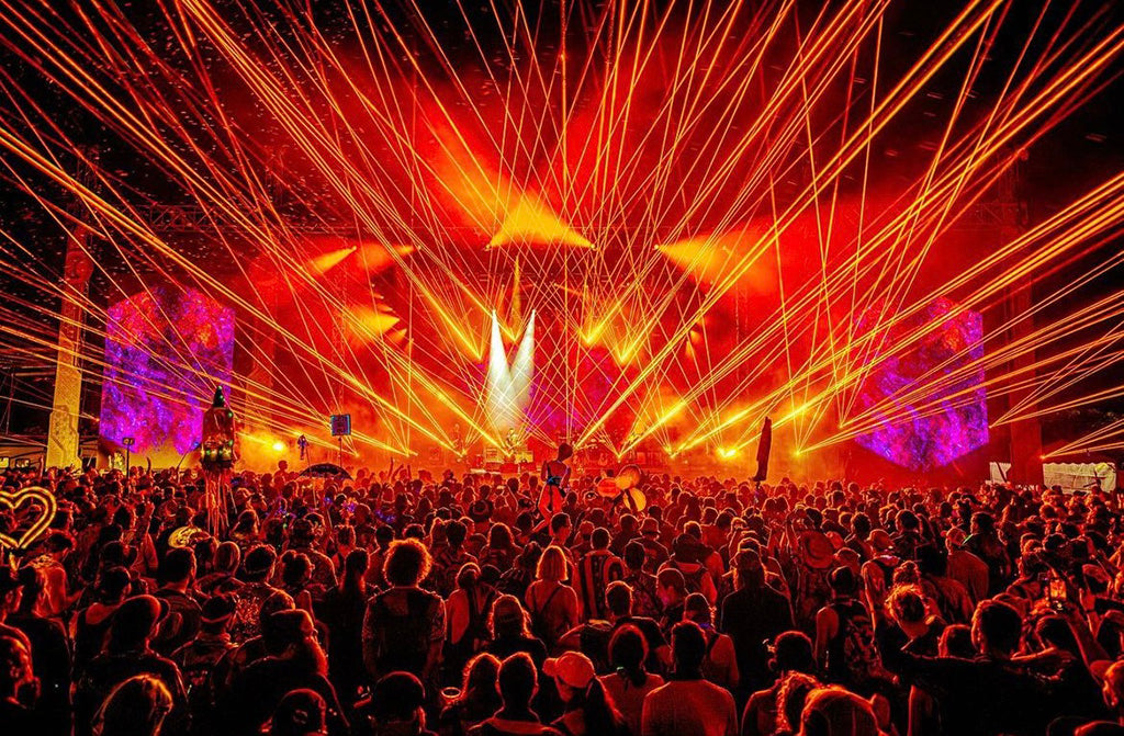 laser aerial beams shine over crowd